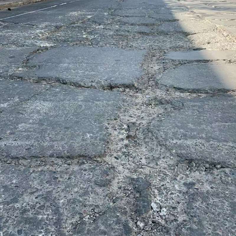 盐源路面起砂露石子修补料